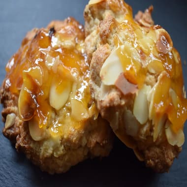 Apricot and Almond Rock Buns on a black board